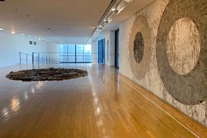 [Richard Long][0], _Inland Sea Driftwood Circle_ (1997) and _River Avon Mud Circles by the Inland Sea_ (1997). Benesse House Museum, Benesse Art Site, Naoshima Island, Japan. Photo: Georges Armaos.


[0]: https://ocula.com/artists/richard-long/